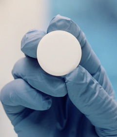 image of hand holding buffer product